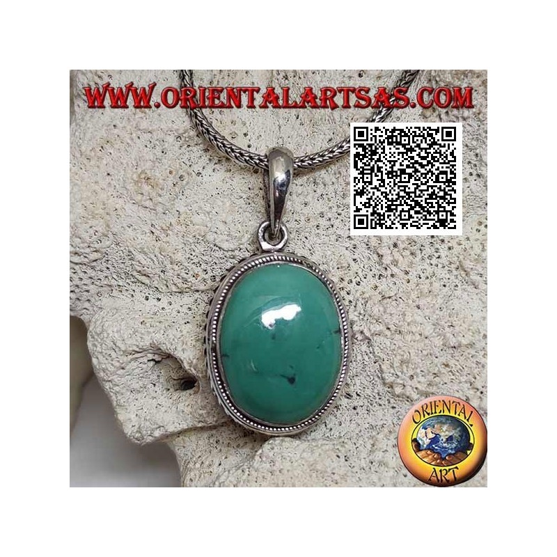 Pendentif en argent avec cabochon turquoise antique ovale entouré d'un tissage hélicoïdal