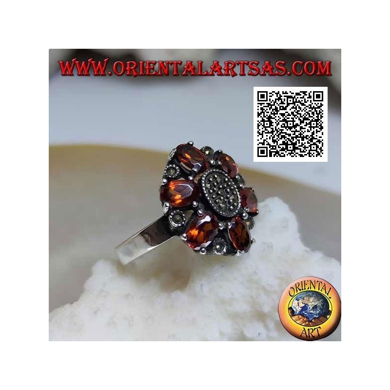 Anillo flor de plata con 6 granates mandarina ovalados (Spessartina) y marcasita central