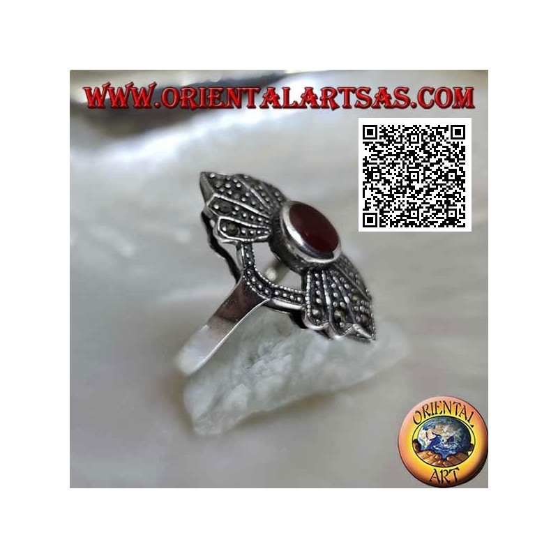 Silver ring with round carnelian in the circle with a 5-shaped fan of marcasite above and below