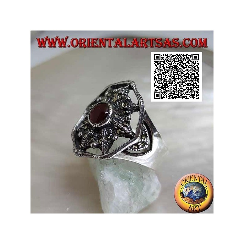 Anillo de plata con cornalina en estrella de ocho puntas tachonada de marcasita en el círculo