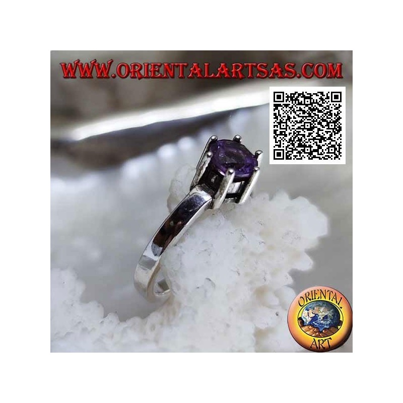 Solitaire style rhodium silver ring with faceted round amethyst set