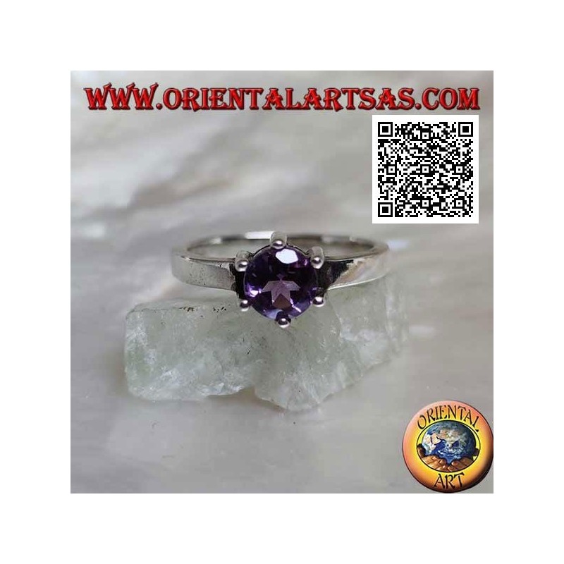 Solitaire style rhodium silver ring with faceted round amethyst set