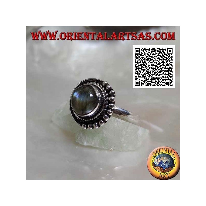 Silver ring with round labradorite surrounded by intertwining and balls only on one half
