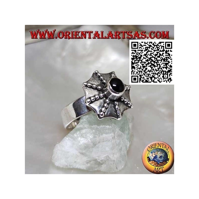 Silver ring in the shape of a pagoda umbrella with a central round onyx