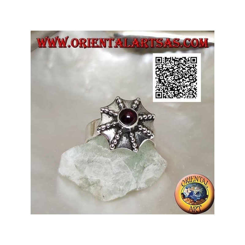 Bague en argent en forme de parapluie pagode avec un grenat rond central