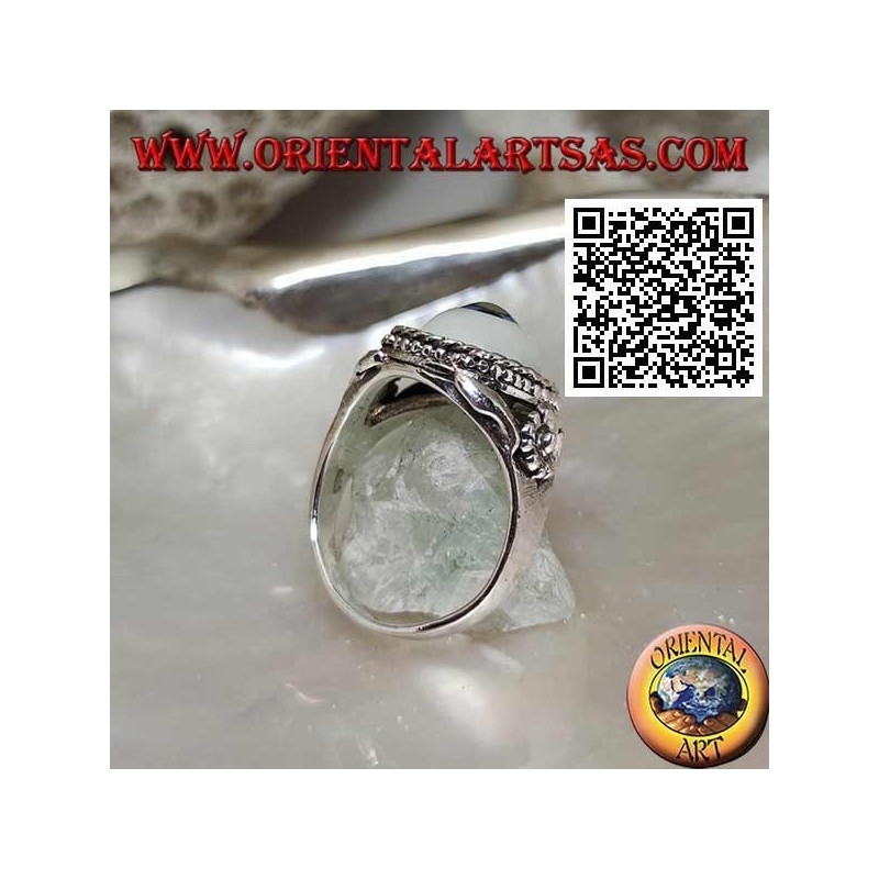 Silver ring with eye with blue pupil surrounded by interweaving