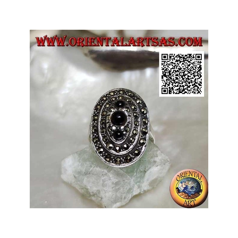 Oval silver ring with three levels of marcasite with a trio of round onyx on top