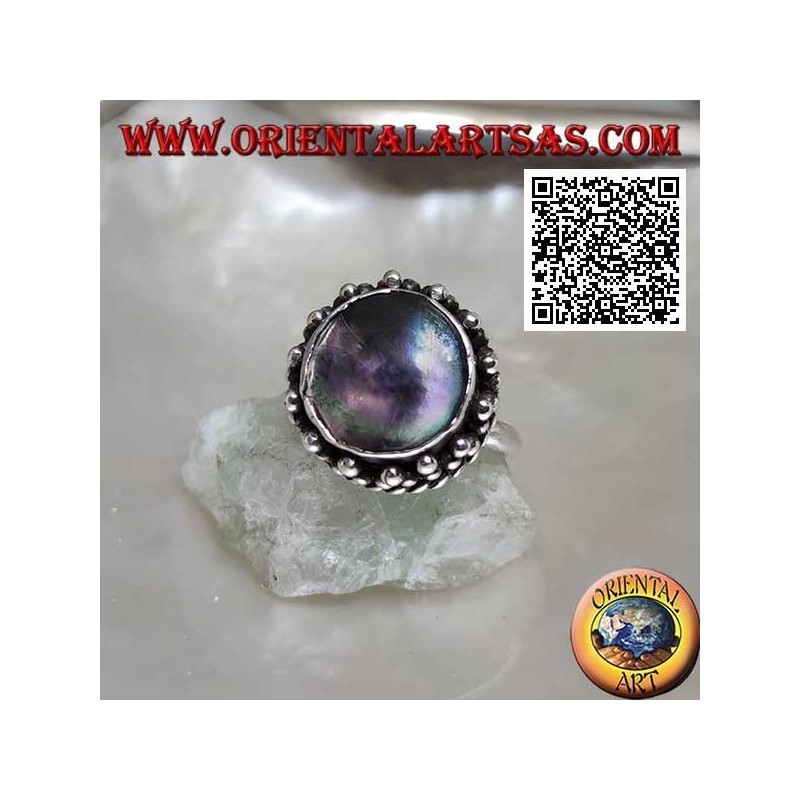 Anillo de plata con concha de paua de abulón redonda rodeada de entretejido y trío de bolas