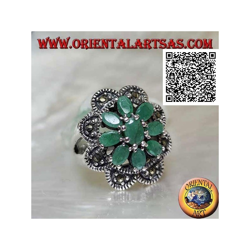 Flower ring in silver with 8 petals of natural emeralds set oval with rounded frame of marcasite