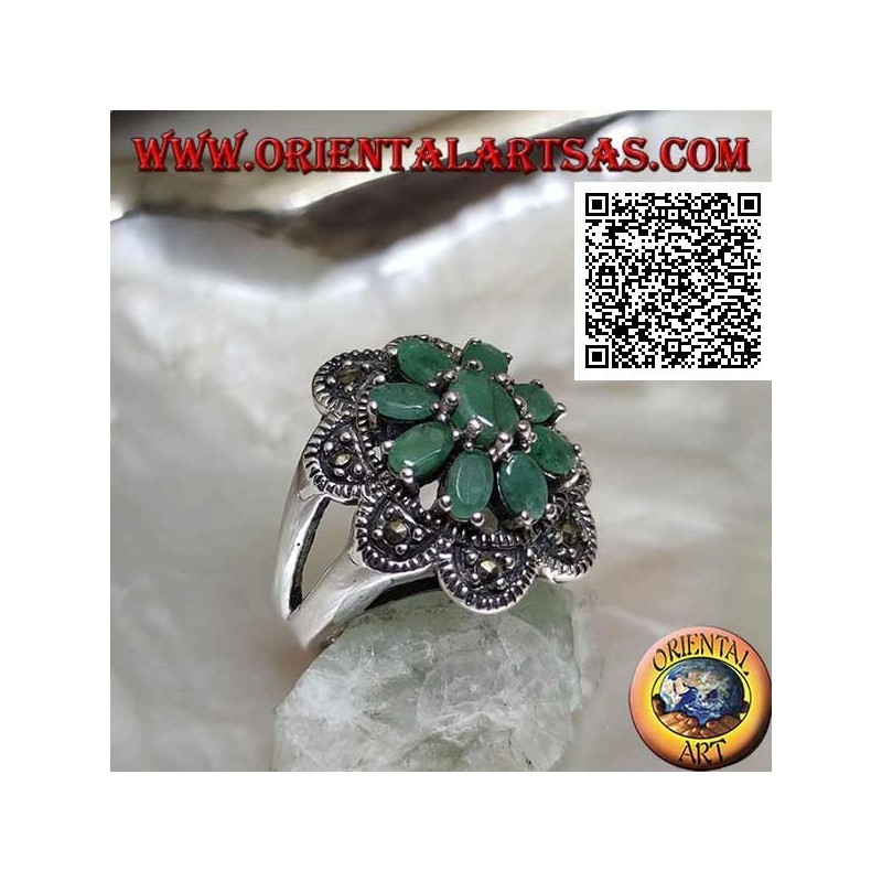 Flower ring in silver with 8 petals of natural emeralds set oval with rounded frame of marcasite