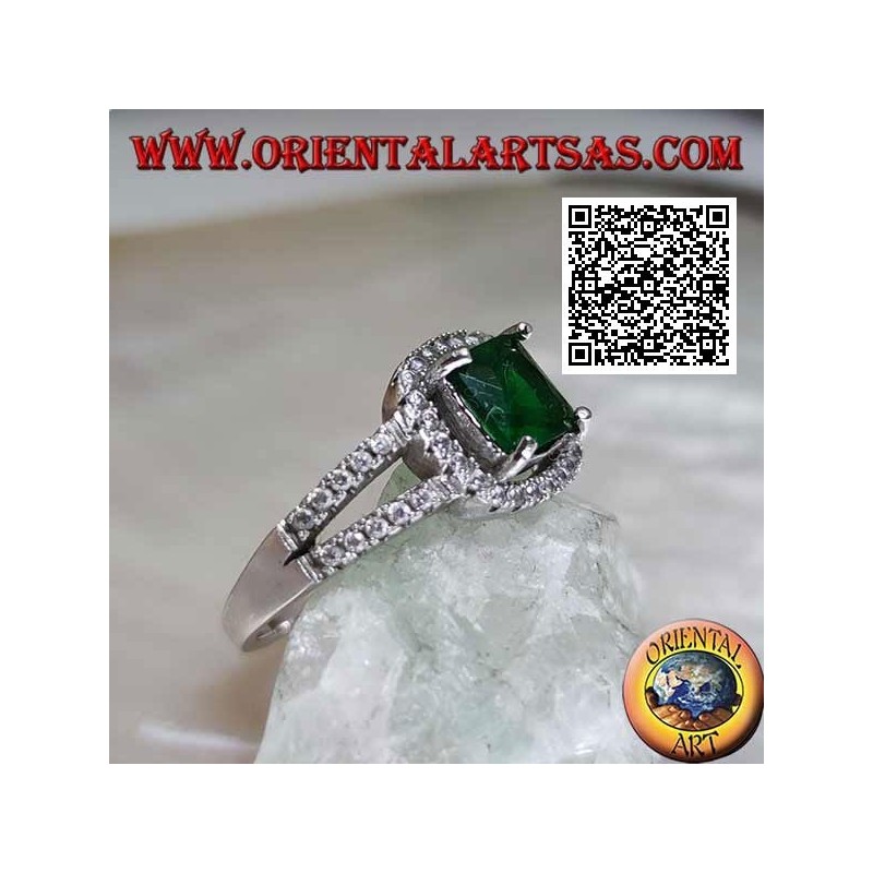 Silver ring with square synthetic emerald set and zircons in the frame and on the two side rows