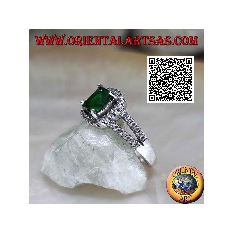 Silver ring with square synthetic emerald set and zircons in the frame and on the two side rows