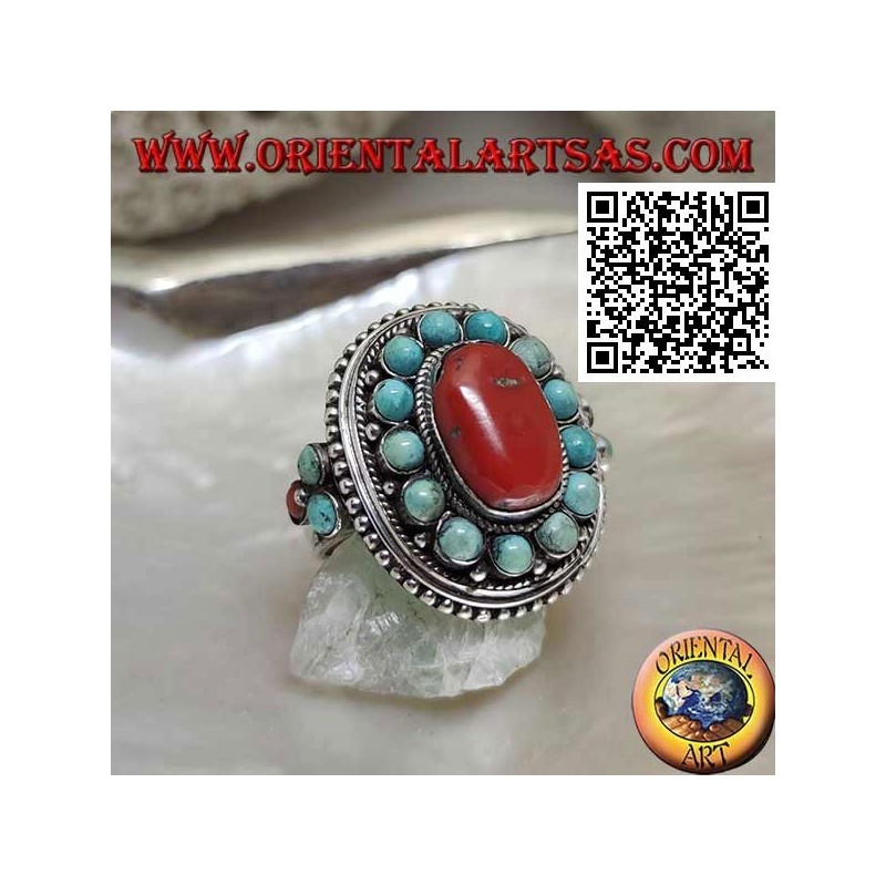 Bague en argent de style népalais avec des sphères ovales naturelles corail et turquoise dans le cadre et sur les côtés