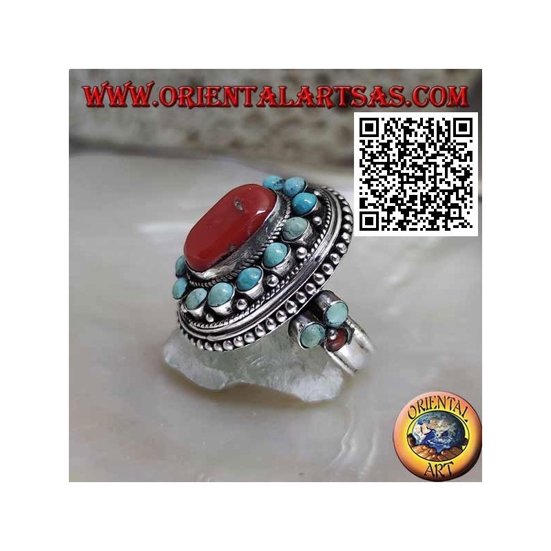 Nepalese style silver ring with natural oval coral and turquoise spheres in the frame and on the sides