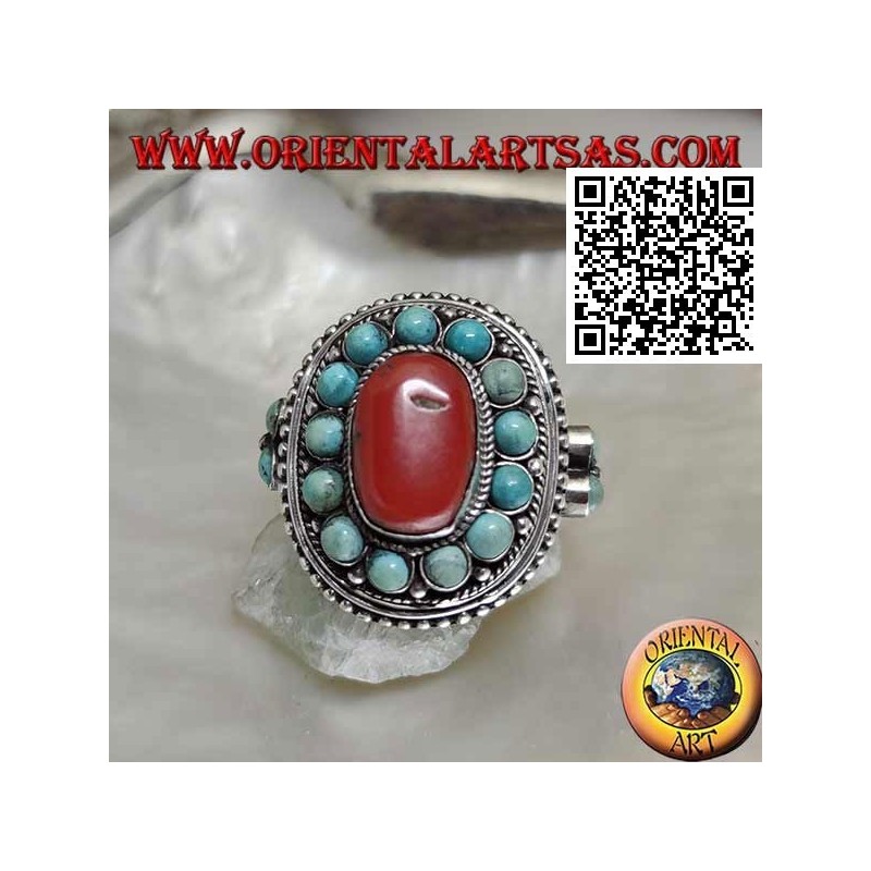 Nepalese style silver ring with natural oval coral and turquoise spheres in the frame and on the sides