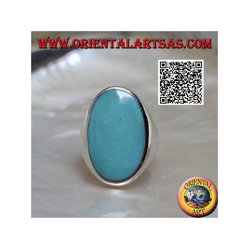 Silver ring with oval turquoise set flush with the edge on a smooth frame