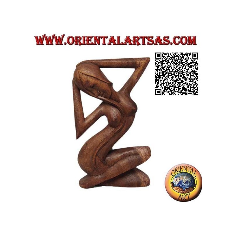 Sculpture d'une femme nue sensuelle aux jambes croisées et cheveux longs, en bois de suar 21 cm