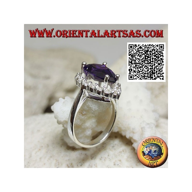 Anello in argento con ametista sintetica a goccia sfaccettata incastonata contornata da zirconi bianchi