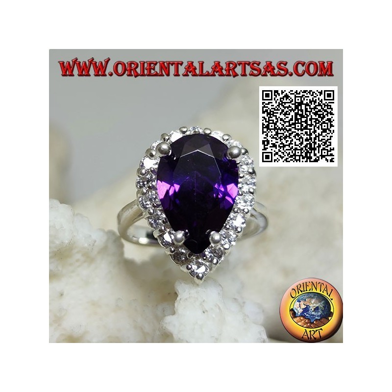 Anello in argento con ametista sintetica a goccia sfaccettata incastonata contornata da zirconi bianchi