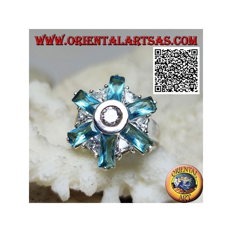 Silver ring with six petals of blue topaz and alternating central white zircons