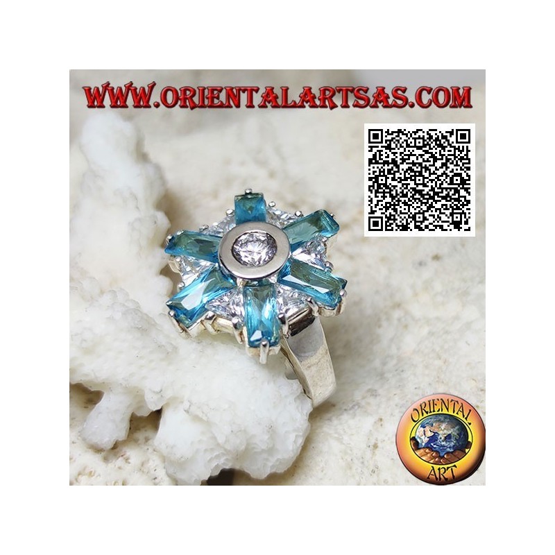 Silver ring with six petals of blue topaz and alternating central white zircons