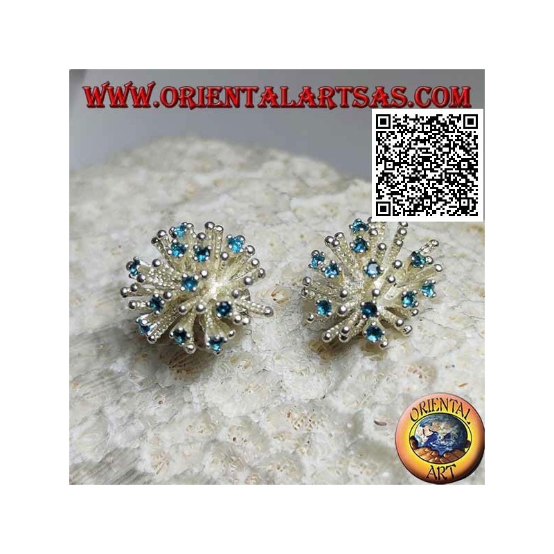 Silver earrings from lobe in the shape of a sea anemone with satin processing and blue zircons set
