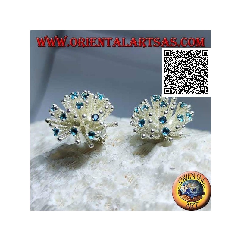 Silver earrings from lobe in the shape of a sea anemone with satin processing and blue zircons set