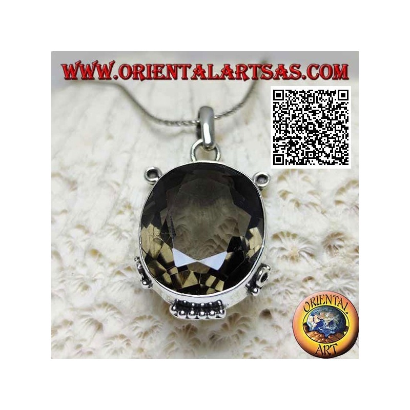 Silver pendant with beautiful faceted oval smoky quartz on smooth frame with inserts