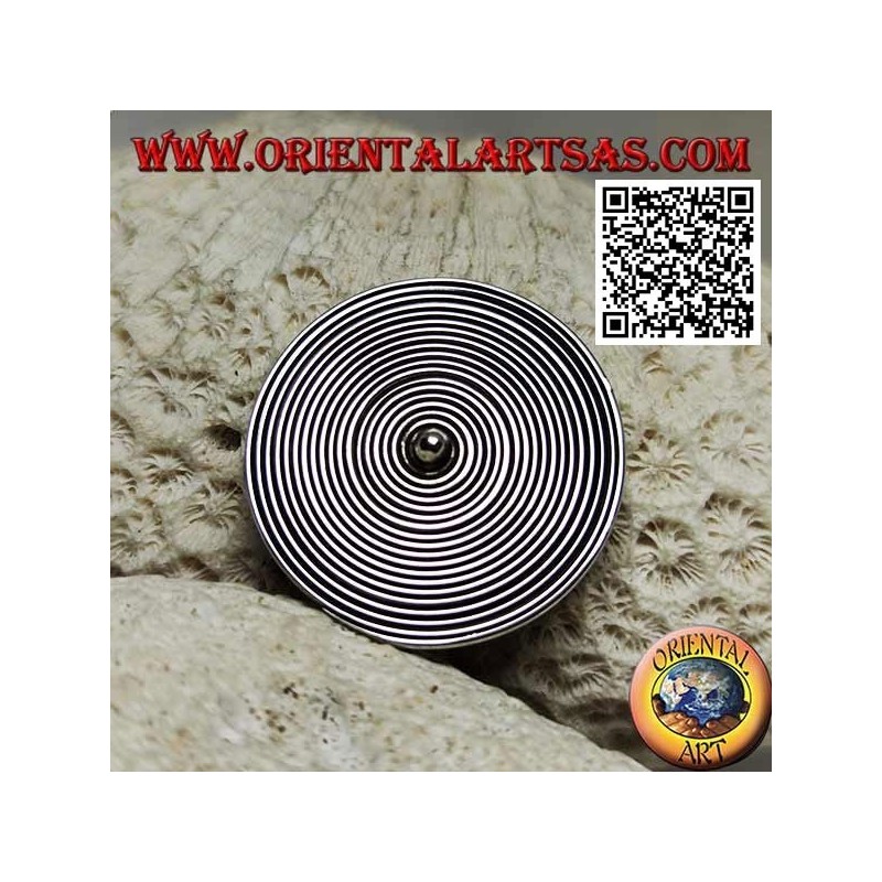 Round spiral silver brooch with central ball