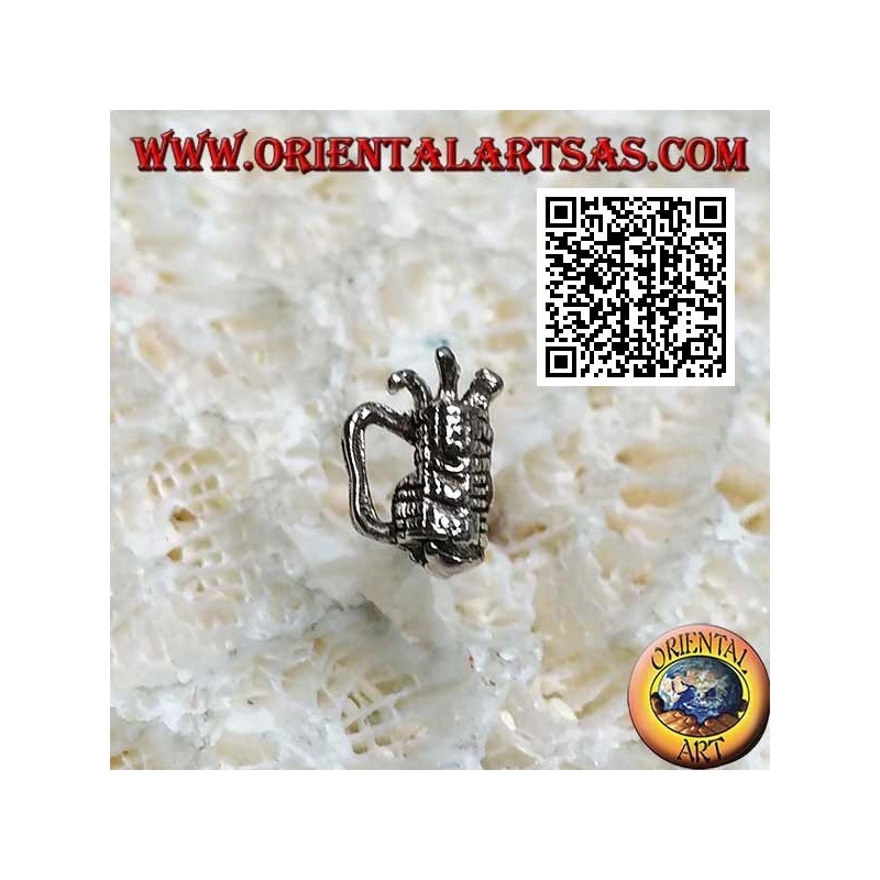 Mini silver earring, golf bag with clubs