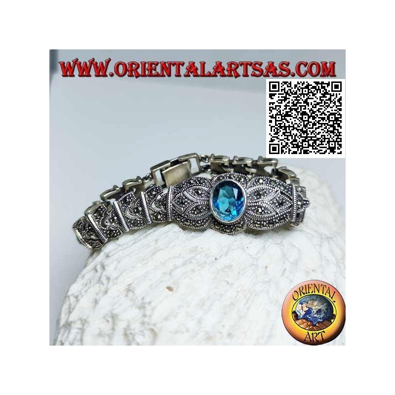 Bracciali in argento a maglie con topazio blu ovale grande sfaccettato centrale tempestato di marcassite