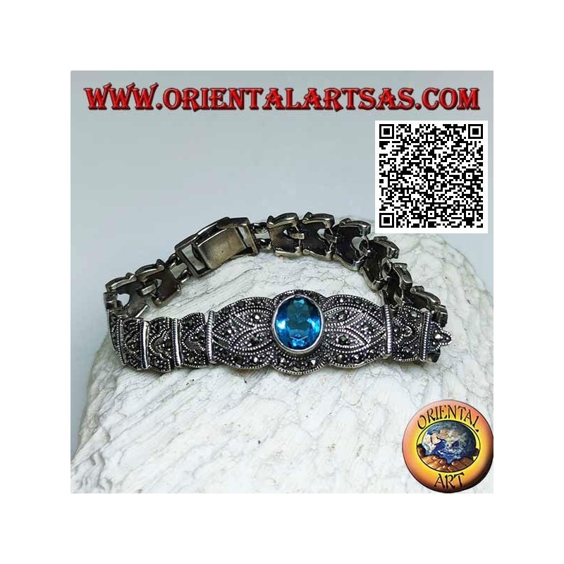 Silberne Gliederarmbänder mit großem zentralen facettierten ovalen blauen Topas, besetzt mit Markasit