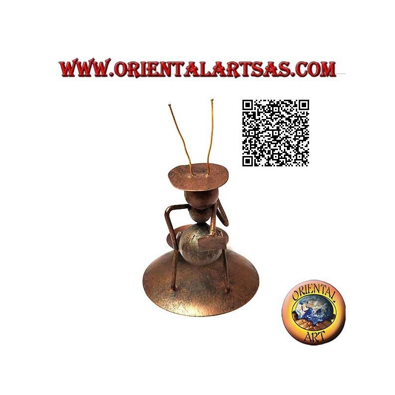 Wrought iron candle holder, peasant ant with a hoe on his shoulders