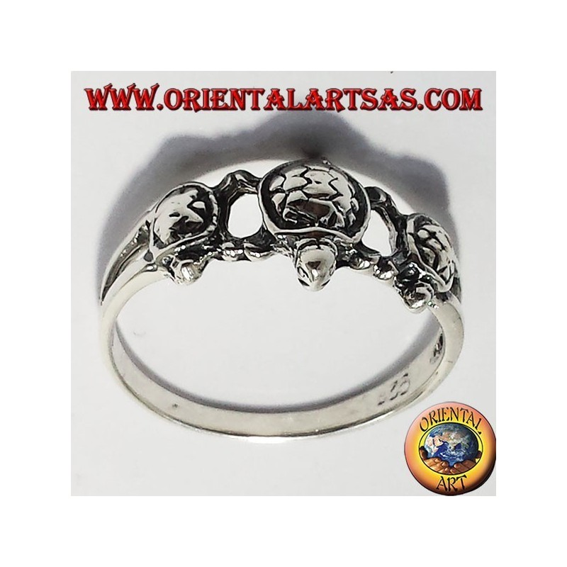 anillo de plata de tres tortugas