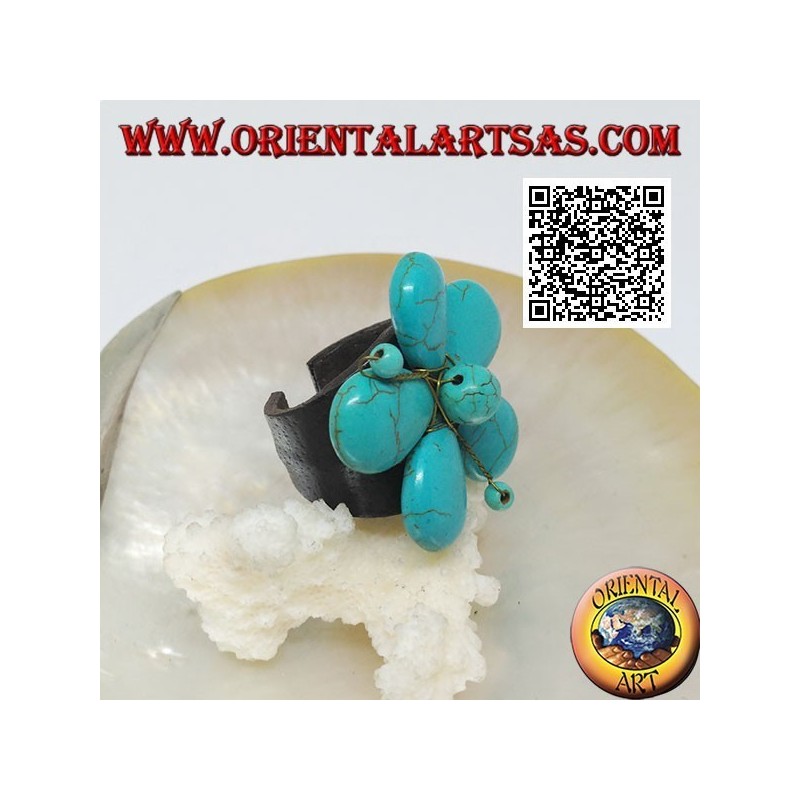 Verstellbarer Ring aus Blumenleder mit Stempeln aus türkisfarbener Paste und goldenen Messingfäden