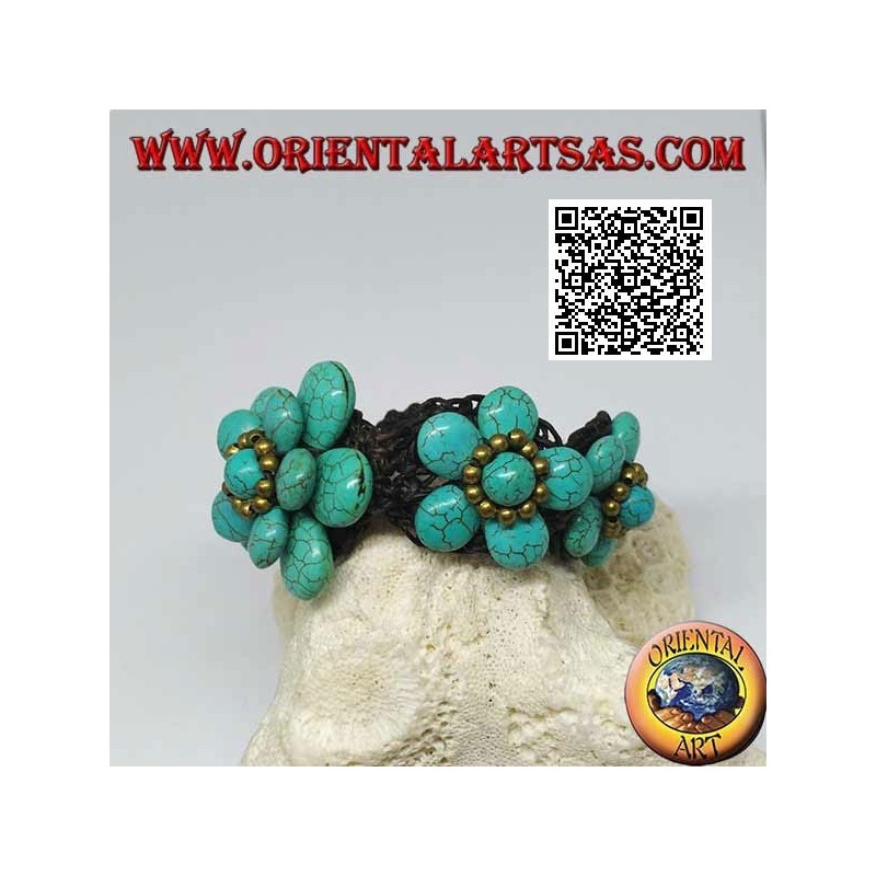 Soft bracelet with five turquoise paste flowers and golden brass balls