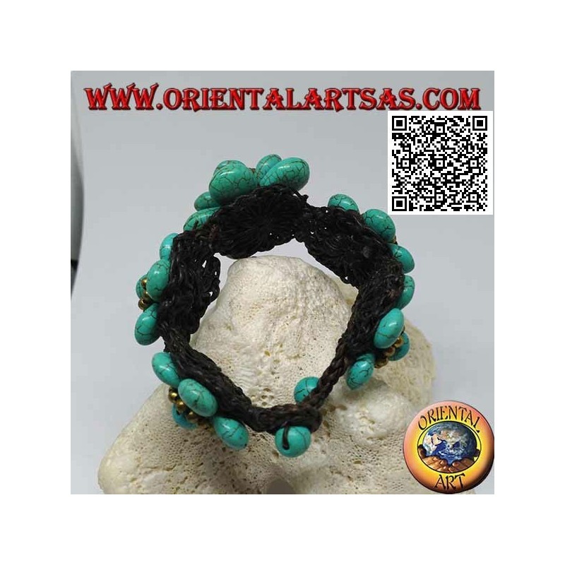 Soft bracelet with five turquoise paste flowers and golden brass balls