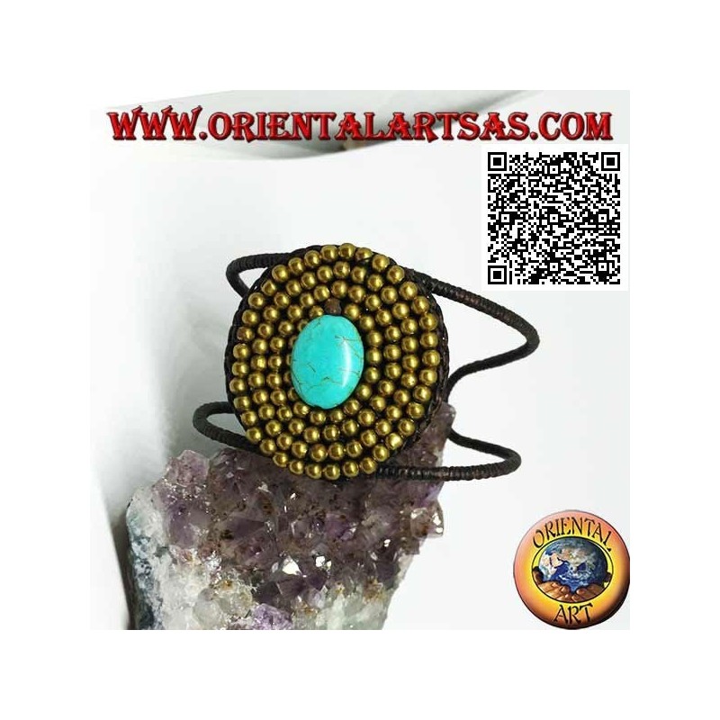 Pulsera rígida ajustable con pasta ovalada turquesa rodeada de bolas en latón dorado (macramé)