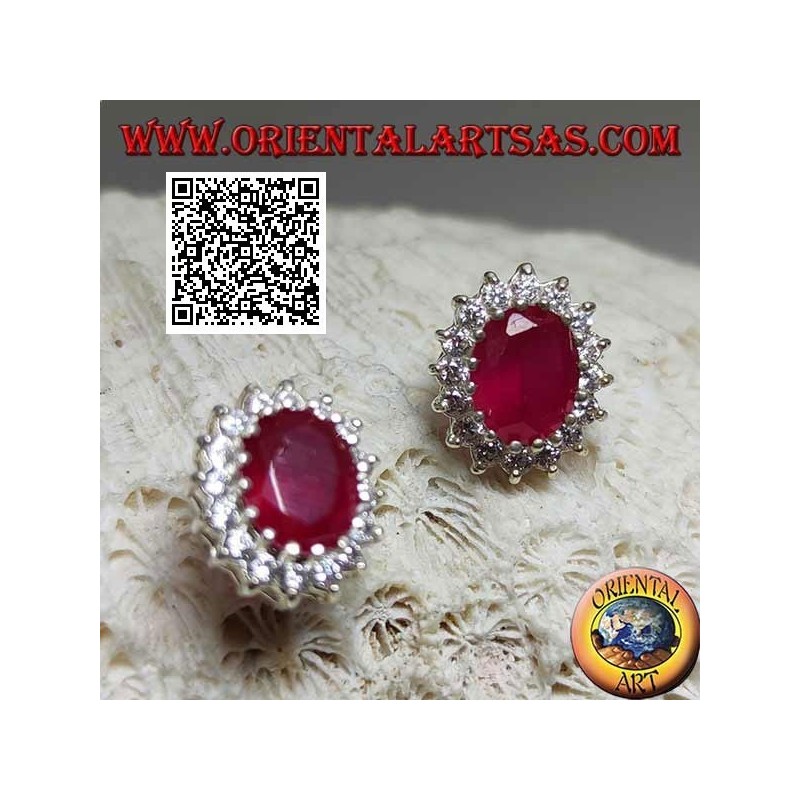 Silver lobe earrings with natural oval ruby surrounded by white zircons