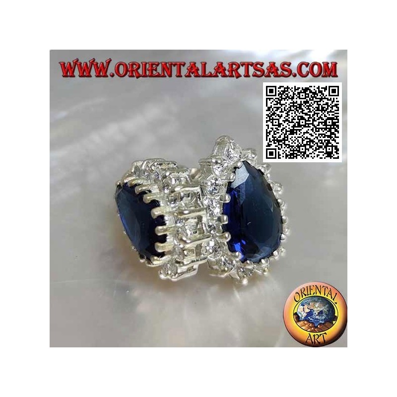 Silver lobe earrings with synthetic teardrop sapphire surrounded by white zircons