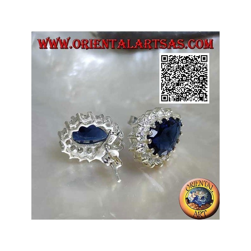 Silver lobe earrings with synthetic teardrop sapphire surrounded by white zircons