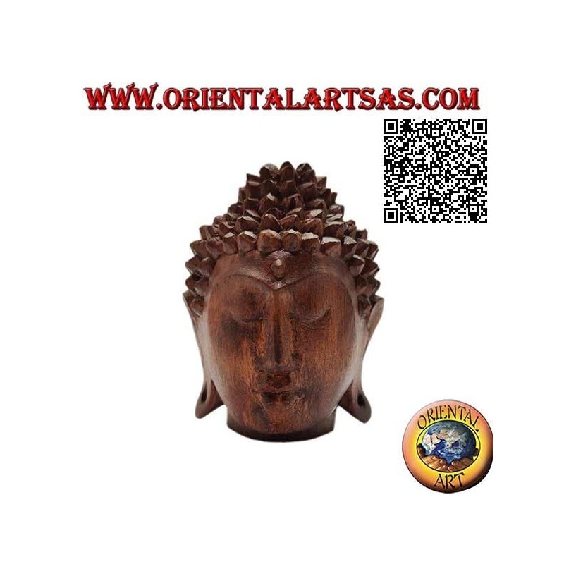 Three-dimensional Buddha head sculpture carved from a single 12 cm block of suar wood