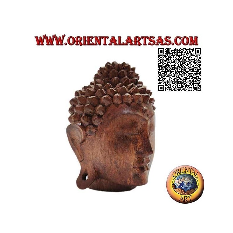 Three-dimensional Buddha head sculpture carved from a single 12 cm block of suar wood