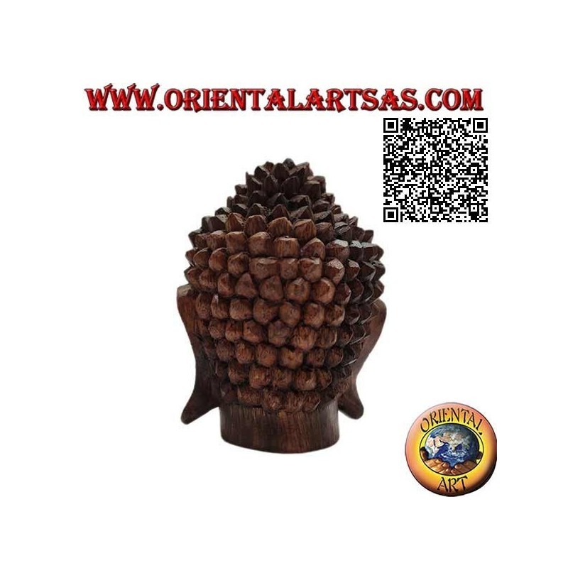 Three-dimensional Buddha head sculpture carved from a single 12 cm block of suar wood