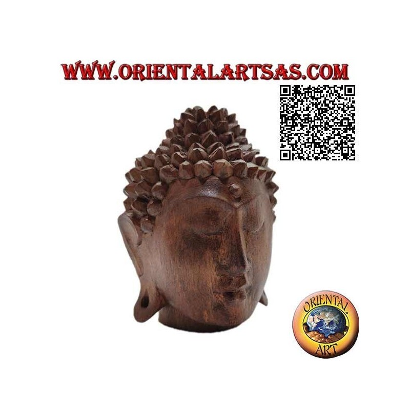 Three-dimensional Buddha head sculpture carved from a single 12 cm block of suar wood