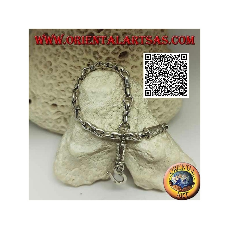 Soft silver chain bracelet with alternating rings and narrow ovals in the center and engraved clasp