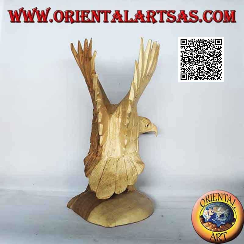 Sculpture of the golden eagle with spread wings standing in suar wood of 23 cm