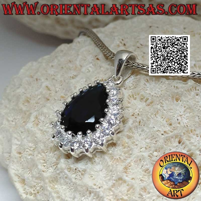 Silver pendant with synthetic teardrop sapphire set surrounded by white zircons