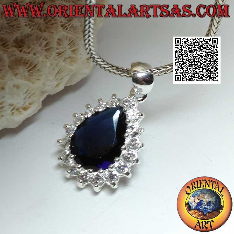 Silver pendant with synthetic teardrop sapphire set surrounded by white zircons