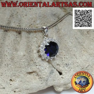 Silver pendant with round synthetic sapphire set surrounded by white zircons